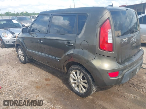 2012 Kia Soul + with VIN KNDJT2A67C7376281, listed as a IAAI auction lot 41955049 with 231,635 mi miles. Bid and sale history available at carsss.com. Image 3.