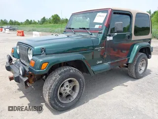 1999 Jeep Wrangler Sahara z VIN 1J4FY49S7XP442719, wystawiony jako IAAI lot #42506510 z przebiegiem 188 175 mil mil oraz . Historia ofert i sprzedaży dostępna na DreamBid. Obrazek 2.