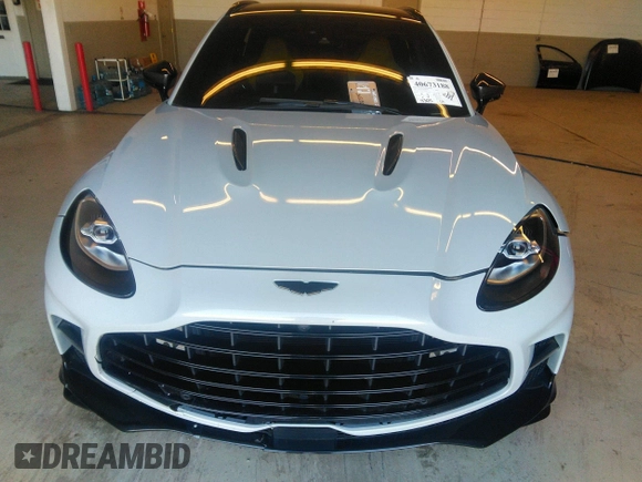 2023 Aston Martin DBX 707 z VIN SD7VUJBW2PTV05712, wystawiony jako IAAI lot #40673188 z przebiegiem 4702 mil mil oraz . Historia ofert i sprzedaży dostępna na DreamBid. Obrazek 13.