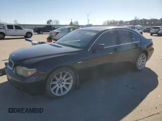 2003 BMW 7 Series 745i with VIN WBAGL63433DP63566, listed as a Copart auction lot 87365424 with 167,697 mi miles and Salvage Title. Bid and sale history available at carsss.com. Image 1.