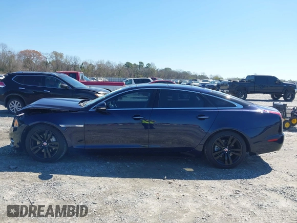 2014 Jaguar XJ Portfolio with VIN SAJWA2GZ4E8V60251, listed as a IAAI auction lot 41778702 with 45,180 mi miles and . Bid and sale history available at DreamBid. Image 14.