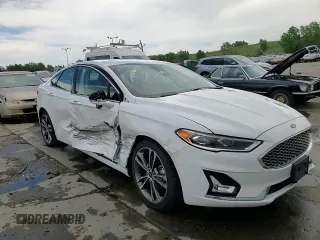 2020 Ford Fusion Titanium with VIN 3FA6P0D96LR175863, listed as a Copart auction lot 60570305 with 76,064 mi miles and Salvage title. Bid and sale history available at DreamBid. Image 13.