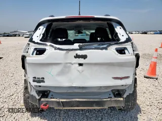 2016 Jeep Cherokee Trailhawk z VIN 1C4PJMBS3GW189266, wystawiony jako Copart lot #56891615 z przebiegiem 94 172 mil mil oraz Szkoda całkowita • Salvage title. Historia ofert i sprzedaży dostępna na DreamBid. Obrazek 6.