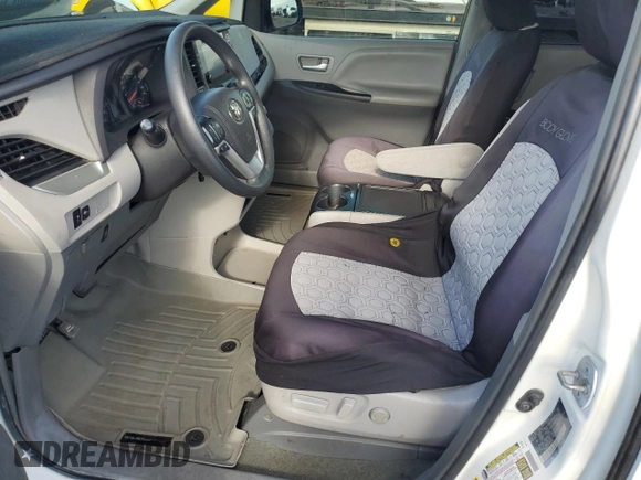 2015 Toyota Sienna LE AAS with VIN 5TDKK3DC9FS665350, listed as a Copart auction lot 49748705 with 107,498 mi miles and Salvage Title. Bid and sale history available at DreamBid. Image 7.
