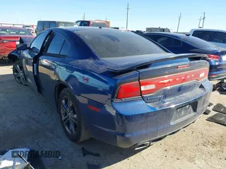 2014 Dodge Charger SXT with VIN 2C3CDXJGXEH255123, listed as a IAAI auction lot 41679977 with 153,032 mi miles. Bid and sale history available at carsss.com. Image 3.