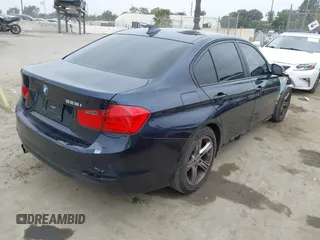 2014 BMW 3 Series 328i with VIN WBA3C1C56EK108665, listed as a IAAI auction lot 42101319 with 84,928 mi miles and . Bid and sale history available at DreamBid. Image 4.