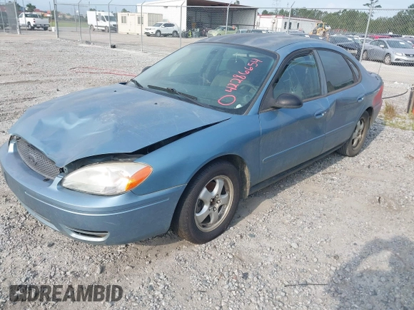 2006 Ford Taurus SE z VIN 1FAFP53U96A241825, wystawiony jako IAAI lot #42286654 z przebiegiem 205 136 mil mil oraz . Historia ofert i sprzedaży dostępna na DreamBid. Obrazek 2.