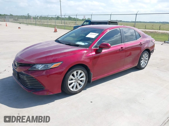 2020 Toyota Camry LE with VIN 4T1L11AK3LU993342, listed as a IAAI auction lot 42033420 with 84,849 mi miles and . Bid and sale history available at DreamBid. Image 17.