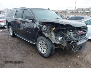 2015 GMC Yukon XL SLT with VIN 1GKS1HKC8FR219289, listed as a IAAI auction lot 40772496 with 163,477 mi miles. Bid and sale history available at carsss.com. Image 1.