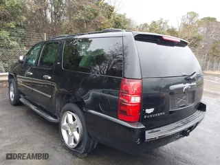 2011 Chevrolet Suburban LTZ with VIN 1GNSCKE02BR206544, listed as a IAAI auction lot 41159341 with 218,202 mi miles. Bid and sale history available at carsss.com. Image 3.
