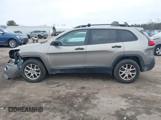 2017 Jeep Cherokee Sport with VIN 1C4PJMAB0HW567739, listed as a IAAI auction lot 41381622 with 120,217 mi miles. Bid and sale history available at carsss.com. Image 14.