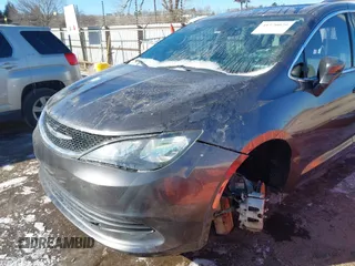 2017 Chrysler Pacifica Touring with VIN 2C4RC1DG7HR648786, listed as a IAAI auction lot 41570029 with 125,406 mi miles and . Bid and sale history available at DreamBid. Image 6.
