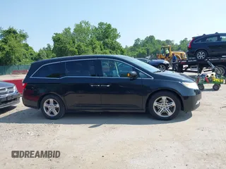 2011 Honda Odyssey Touring with VIN 5FNRL5H97BB073708, listed as a IAAI auction lot 42409164 with 141,986 mi miles and . Bid and sale history available at DreamBid. Image 13.