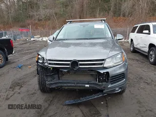 2013 Volkswagen Touareg Lux with VIN WVGEF9BP0DD005082, listed as a IAAI auction lot 41667026 with 140,148 mi miles and . Bid and sale history available at DreamBid. Image 13.