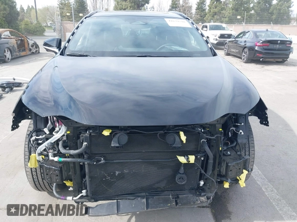2024 Lexus NX with VIN JTJKKCFZ2R2037740, listed as a IAAI auction lot 41679598 with 6,907 mi miles. Bid and sale history available at carsss.com. Image 13.