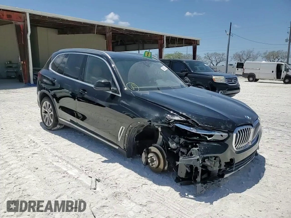 2023 BMW X5 sDrive40i with VIN 5UXCR4C05P9R70324, listed as a Copart auction lot 54661245 with 13,136 mi miles and Salvage title. Bid and sale history available at DreamBid. Image 13.