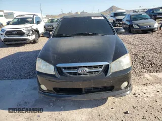 2006 Kia Spectra with VIN KNAFE162065241706, listed as a Copart auction lot 68949914 with 153,169 mi miles and Salvage Title. Bid and sale history available at carsss.com. Image 5.
