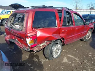 2002 Jeep Grand Cherokee Limited with VIN 1J4GX58S82C228062, listed as a IAAI auction lot 41657705 with 168,991 mi miles and . Bid and sale history available at DreamBid. Image 4.