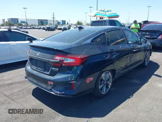 2018 Honda Clarity Touring with VIN JHMZC5F3XJC006383, listed as a IAAI auction lot 41996524 with 100,646 mi miles and . Bid and sale history available at DreamBid. Image 4.
