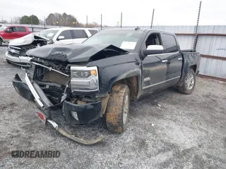 2016 Chevrolet Silverado 1500 High Country with VIN 3GCUKTEC2GG366838, listed as a IAAI auction lot 41258249 with 160,460 mi miles and . Bid and sale history available at DreamBid. Image 2.