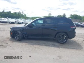 2023 Jeep Grand Cherokee Laredo with VIN 1C4RJHAG2PC660094, listed as a IAAI auction lot 42390290 with 27,802 mi miles and . Bid and sale history available at DreamBid. Image 14.