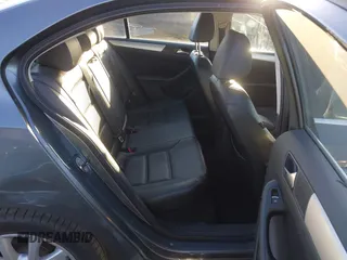 2014 Volkswagen Jetta SE z VIN 3VWD17AJ1EM285792, wystawiony jako IAAI lot #41652684 z przebiegiem 169 929 mil mil oraz . Historia ofert i sprzedaży dostępna na DreamBid. Obrazek 8.