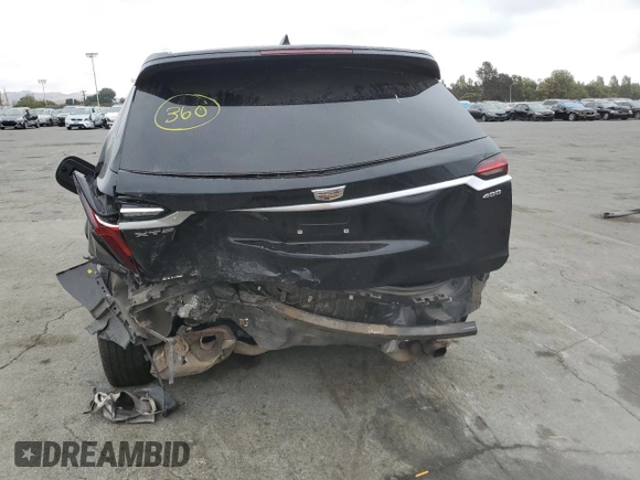 2022 Cadillac XT6 Premium Luxury with VIN 1GYKPDRS5NZ110989, listed as a Copart auction lot 69600894 with 56,148 mi miles and Salvage Title. Bid and sale history available at carsss.com. Image 6.