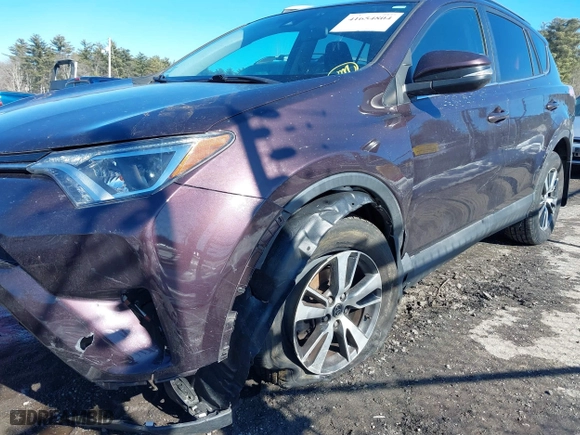 2018 Toyota RAV4 XLE with VIN 2T3RFREV6JW839890, listed as a IAAI auction lot 41654804 with 72,038 mi miles. Bid and sale history available at carsss.com. Image 6.