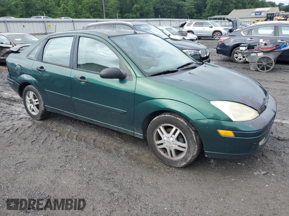 2000 Ford Focus SE with VIN 1FAFP3433YW354797, listed as a Copart auction lot 61430265 with 165,202 mi miles and Salvage title. Bid and sale history available at DreamBid. Image 4.