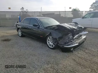 2004 Jaguar XJ with VIN SAJEA71C54SG01455, listed as a Copart auction lot 86591014 with 83,977 mi miles and Salvage Title. Bid and sale history available at carsss.com. Image 11.