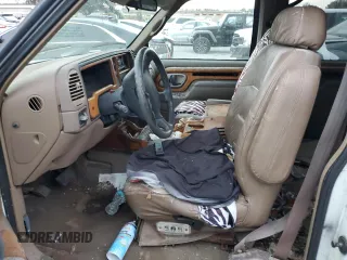 1995 GMC Suburban z VIN 1GKFK16K3SJ704911, wystawiony jako Copart lot #88326825 z przebiegiem 191 006 mil mil oraz Szkoda całkowita • Salvage title. Historia ofert i sprzedaży dostępna na DreamBid. Obrazek 7.
