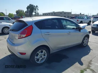 2014 Ford Fiesta SE with VIN 3FADP4EJ8EM121567, listed as a IAAI auction lot 42229439 with 108,640 mi miles and . Bid and sale history available at DreamBid. Image 4.
