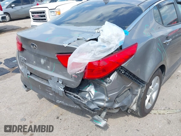 2015 Kia Optima LX with VIN 5XXGM4A71FG423232, listed as a IAAI auction lot 42054131 with 135,213 mi miles. Bid and sale history available at carsss.com. Image 6.