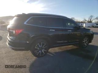 2021 Honda Pilot Touring 8-Passenger with VIN 5FNYF5H94MB039974, listed as a Copart auction lot 82654964 with 54,048 mi miles and Salvage Title. Bid and sale history available at DreamBid. Image 3.
