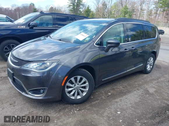 2017 Chrysler Pacifica Touring L with VIN 2C4RC1BGXHR667397, listed as a IAAI auction lot 42085117 with 63,996 mi miles and . Bid and sale history available at DreamBid. Image 19.