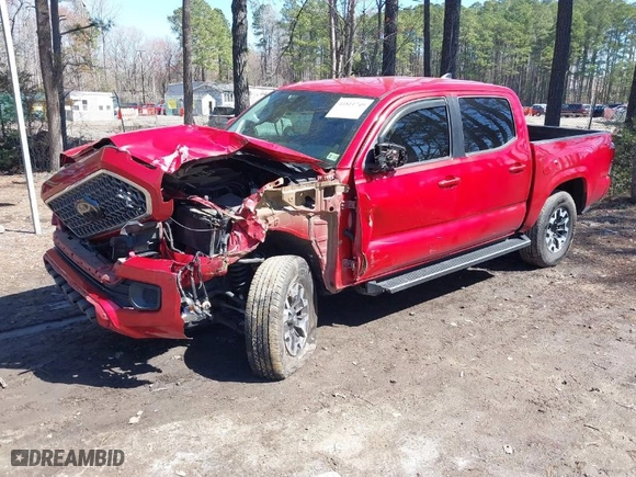 2019 Toyota Tacoma 4WD SR with VIN 3TMCZ5ANXKM279726, listed as a IAAI auction lot 41811749 with 56,017 mi miles. Bid and sale history available at carsss.com. Image 2.