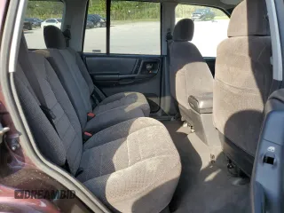 1997 Jeep Grand Cherokee Laredo with VIN 1J4GZ58S5VC688455, listed as a Copart auction lot 74294204 with 135,143 mi miles and Salvage Title. Bid and sale history available at carsss.com. Image 10.