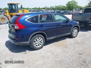 2015 Honda CR-V EX with VIN 2HKRM3H5XFH513085, listed as a IAAI auction lot 42085179 with 83,801 mi miles and . Bid and sale history available at carsss.com. Image 4.