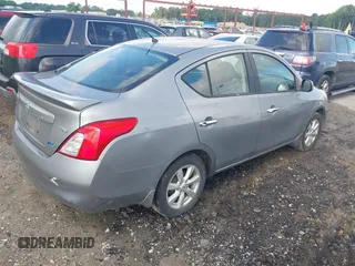 2014 Nissan Versa SV with VIN 3N1CN7APXEL862867, listed as a IAAI auction lot 42447084 with 202,413 mi miles and . Bid and sale history available at DreamBid. Image 4.