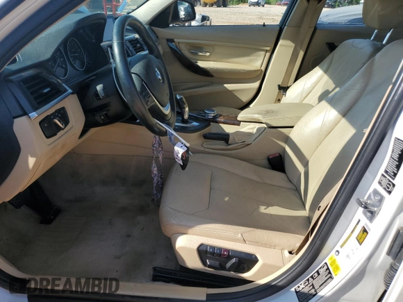 2014 BMW 3 Series 328i xDrive with VIN WBA3B5C51EF958576, listed as a Copart auction lot 62089375 with 148,140 mi miles and Salvage title. Bid and sale history available at DreamBid. Image 7.