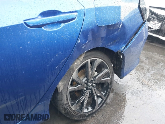 2021 Honda Civic Sport with VIN 2HGFC2F87MH554620, listed as a IAAI auction lot 41743596 with 52,327 mi miles and . Bid and sale history available at DreamBid. Image 6.