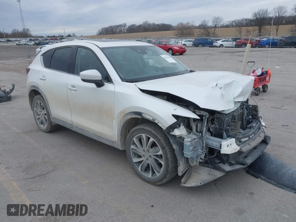2023 Mazda CX-5 2.5 S Premium Plus Package with VIN JM3KFBEMXP0103278, listed as a IAAI auction lot 40954999 with 100,798 mi miles. Bid and sale history available at carsss.com. Image 1.