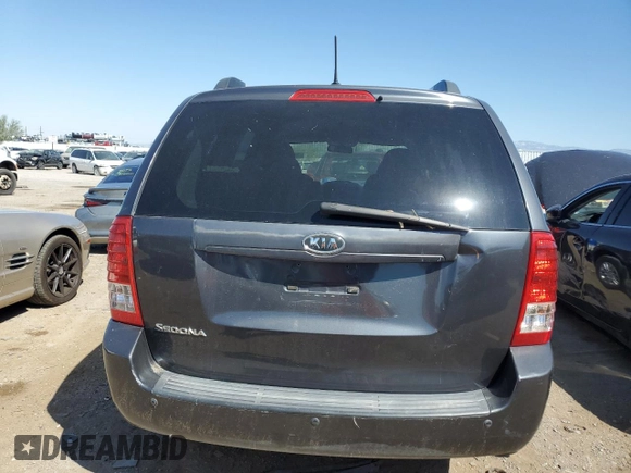 2012 Kia Sedona LX with VIN KNDMG4C71C6461660, listed as a Copart auction lot 70904534 with 163,548 mi miles and Clean Title. Bid and sale history available at carsss.com. Image 6.