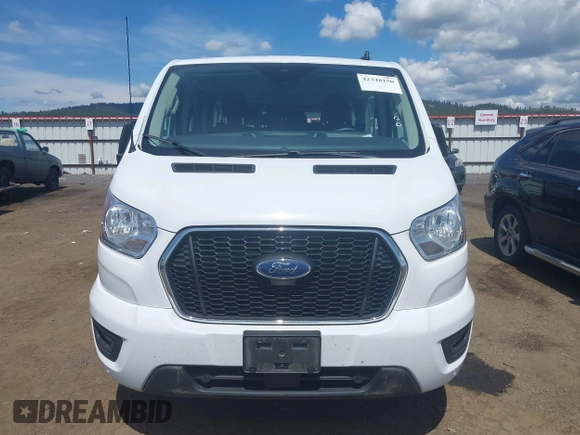 2021 Ford Transit Passenger XL z VIN 1FBAX2Y87MKA31170, wystawiony jako IAAI lot #42348150 z przebiegiem 60 124 mil mil oraz . Historia ofert i sprzedaży dostępna na DreamBid. Obrazek 12.