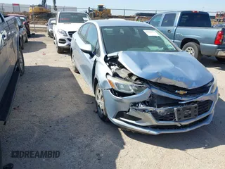 2017 Chevrolet Cruze LS z VIN 1G1BC5SM3H7145915, wystawiony jako IAAI lot #41969473 z przebiegiem 176 587 mil mil oraz . Historia ofert i sprzedaży dostępna na DreamBid. Obrazek 1.