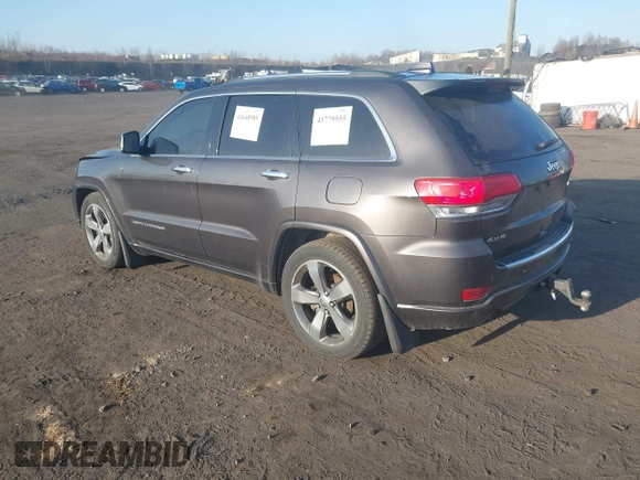 2015 Jeep Grand Cherokee Overland with VIN 1C4RJFCT3FC725239, listed as a IAAI auction lot 41779555 with 100,837 mi miles. Bid and sale history available at carsss.com. Image 3.