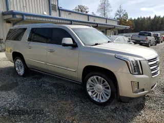 2015 Cadillac Escalade ESV Platinum z VIN 1GYS4UKJ7FR609546, wystawiony jako Copart lot #77941594 z przebiegiem 168 117 mil mil oraz Czysty tytuł • Clean title. Historia ofert i sprzedaży dostępna na DreamBid. Obrazek 4.