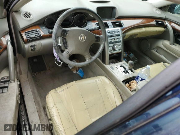 2005 Acura RL z VIN JH4KB16515C014781, wystawiony jako Copart lot #60787895 z przebiegiem Nie podano mil oraz Szkoda całkowita • Salvage title. Historia ofert i sprzedaży dostępna na DreamBid. Obrazek 8.