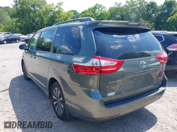 2018 Toyota Sienna XLE with VIN 5TDDZ3DC4JS189540, listed as a IAAI auction lot 42594973 with 103,374 mi miles and . Bid and sale history available at DreamBid. Image 3.