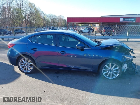 2017 Mazda 3 Touring with VIN 3MZBN1V74HM104034, listed as a IAAI auction lot 41823286 with 53,282 mi miles and . Bid and sale history available at DreamBid. Image 13.